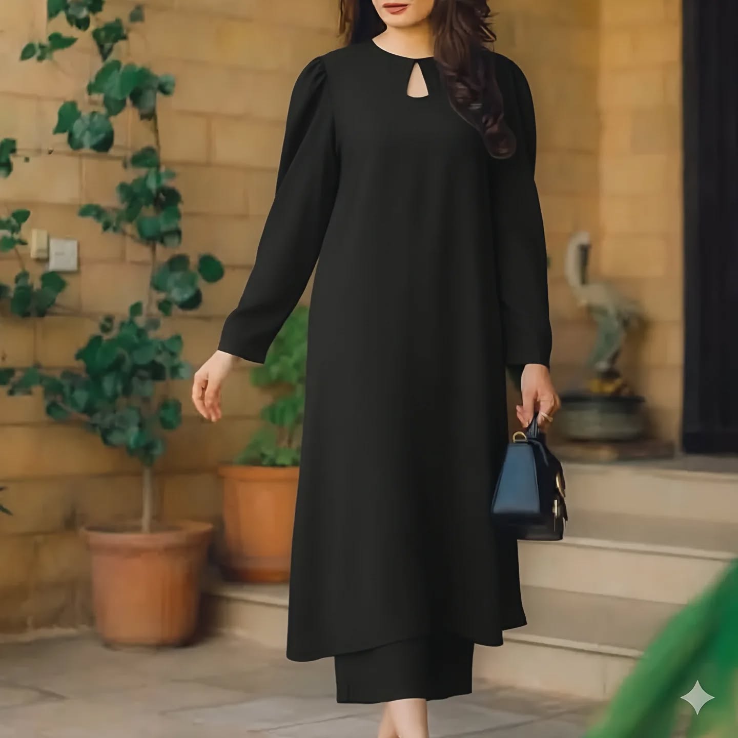Womens New Long Dress in black, featuring a keyhole neckline and puffed sleeves, perfect for any occasion.